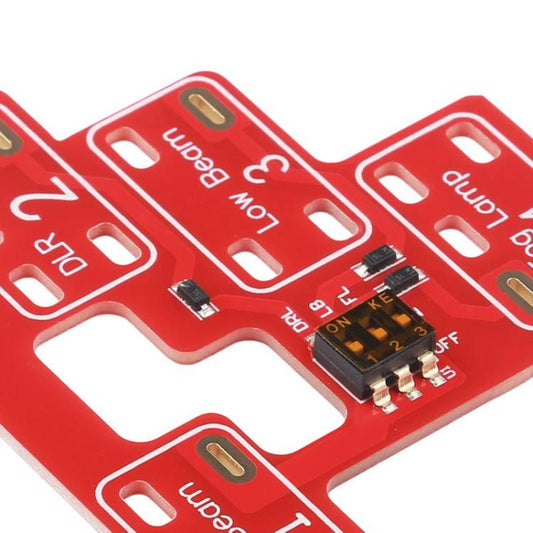 Red circuit board close-up with microchip and small electronic components