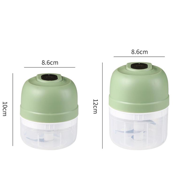 Green mini food chopper with clear bowl, top controls, and size measurements