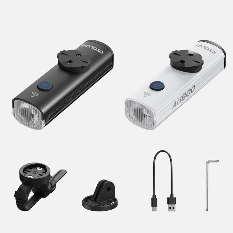 Black and white bicycle headlights with mounting hardware and charging cable