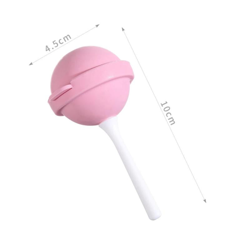 Pink lollipop-shaped ice pop silicone mold with white stick, about 10 cm long