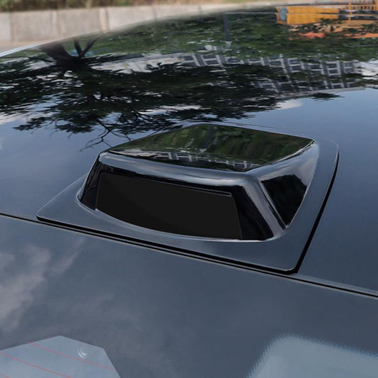 Glossy black car roof decorative cover with simulated lidar-style raised design on top