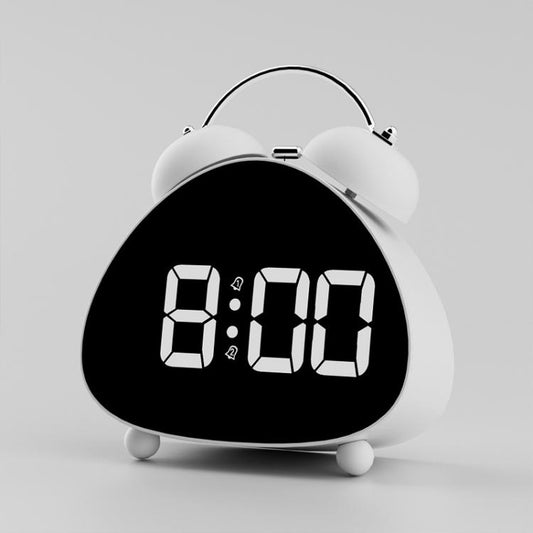 White twin-bell alarm clock with glowing white digital time on black face.