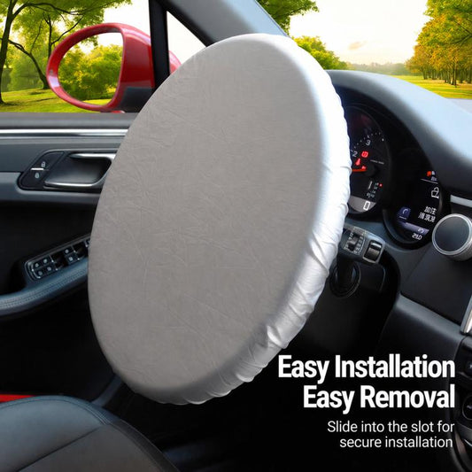 Silver steering wheel sunshade cover fitted over steering wheel