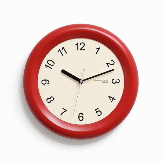 Silent wall clock, red rim and cream dial with black second hand and Arabic numerals