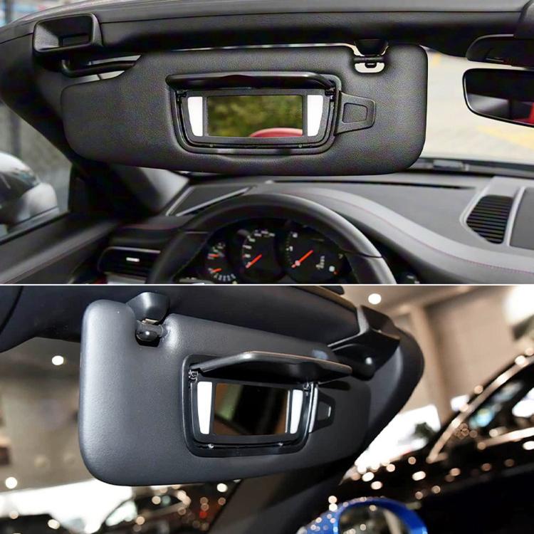 Sun visor vanity mirror installed on car interior, showing rectangular mirror window.