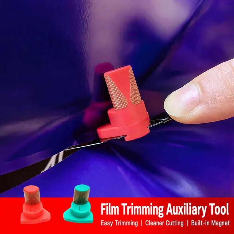 Tint film trimming auxiliary tool being used with red guide along film edge