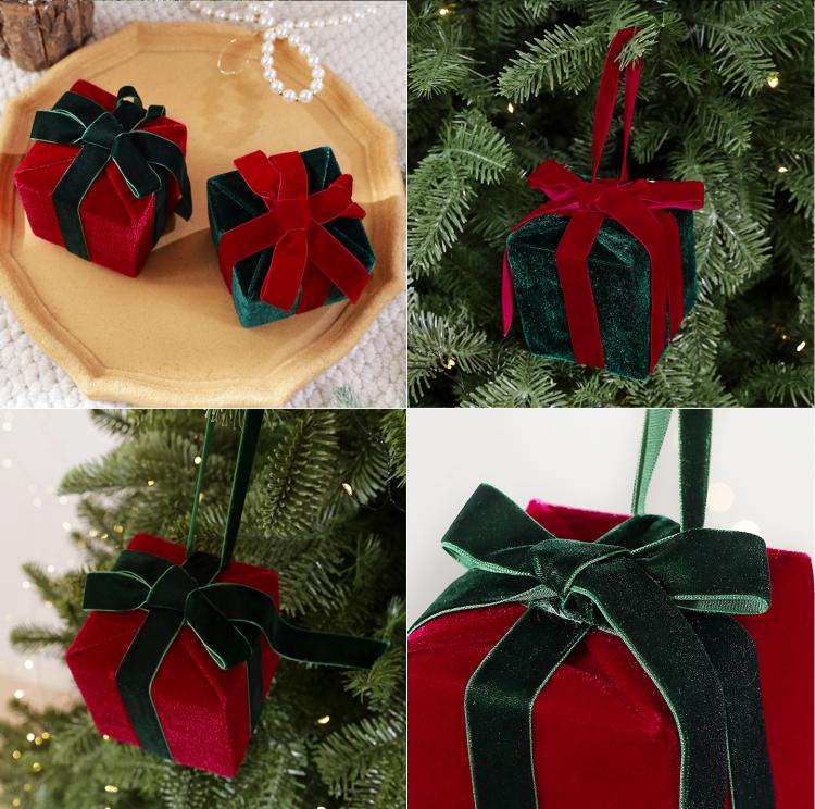 Velvet gift box ornaments in red and dark green with matching ribbon bows and loops