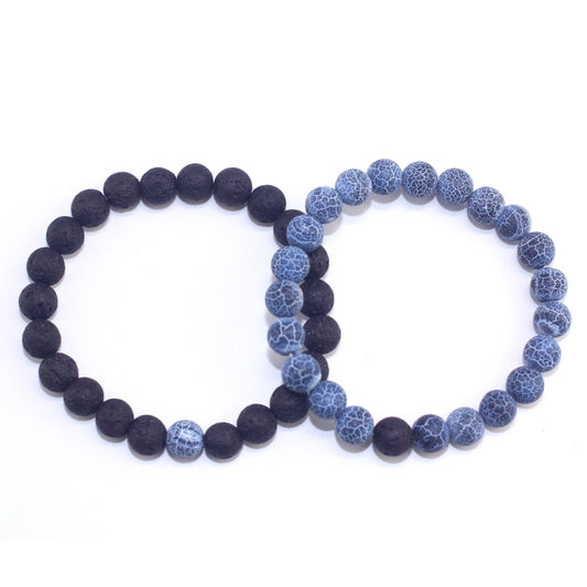 Set of two beaded bracelets: matte black and blue crackle round beads