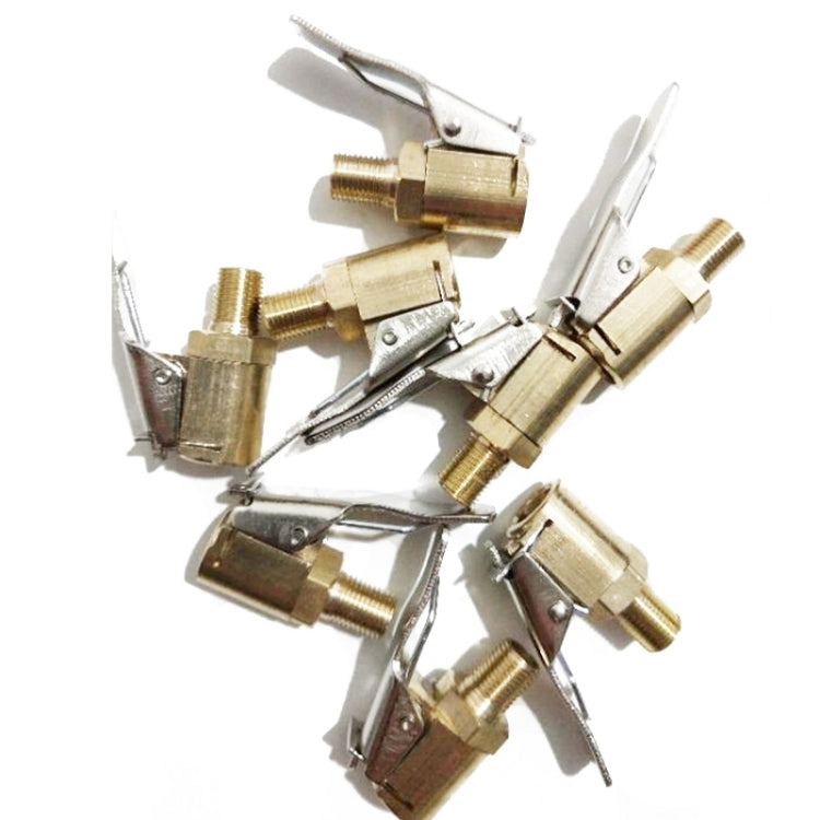 Assorted brass tire inflator valve clip connector pieces with silver clamp levers
