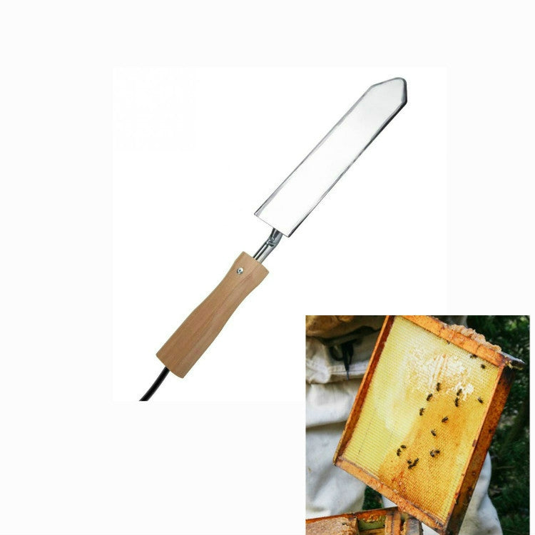 Electric honeycomb cutting knife with wooden grip and rectangular metal heating head
