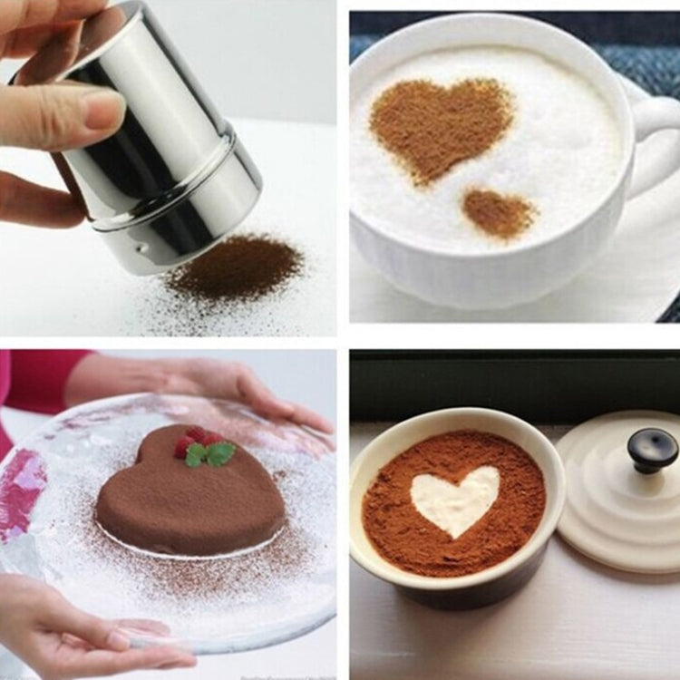 Stainless steel powder shaker dispensing cocoa dust onto surface