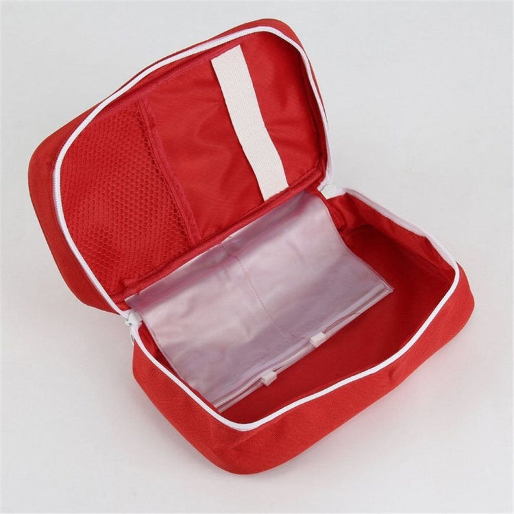 Open red first aid kit bag with removable inner panels and elastic compartments