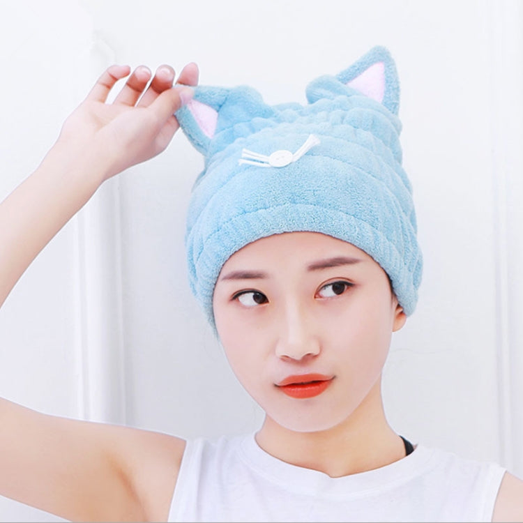Blue cat-ear hair drying cap with plush fleece and button tie, worn by model