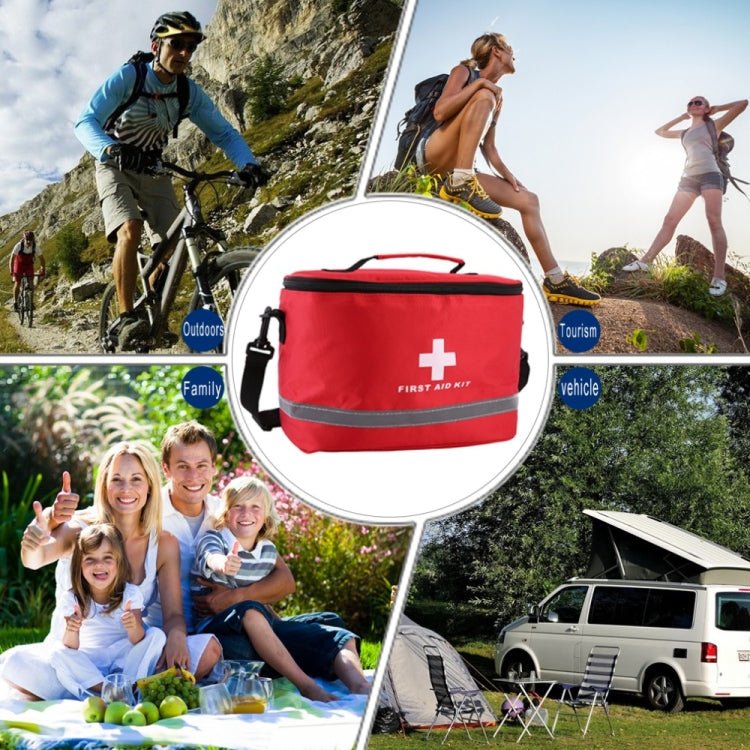 Red first aid kit bag with white cross emblem and reflective gray band