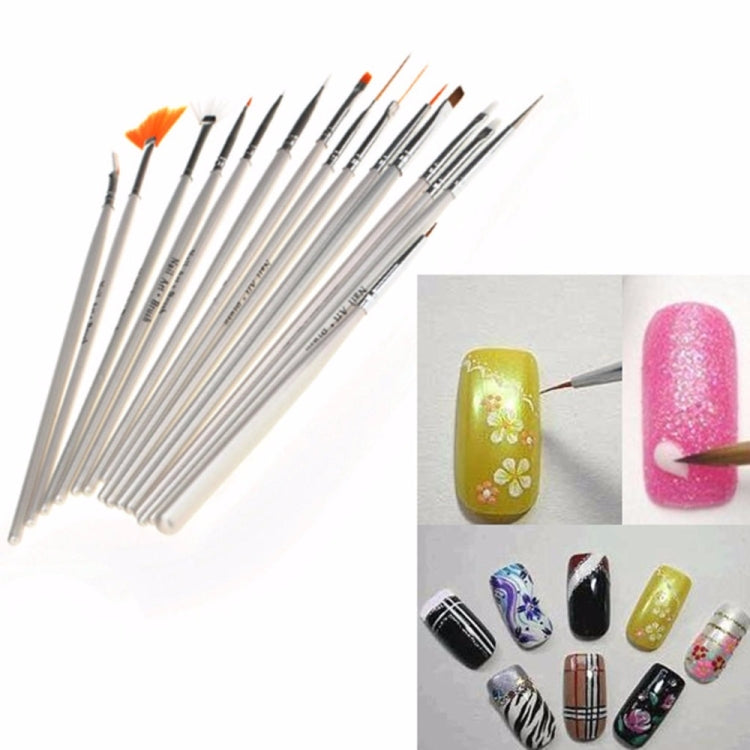Assorted nail art tools: multiple thin liner brushes with white handles and silver metal ferrules