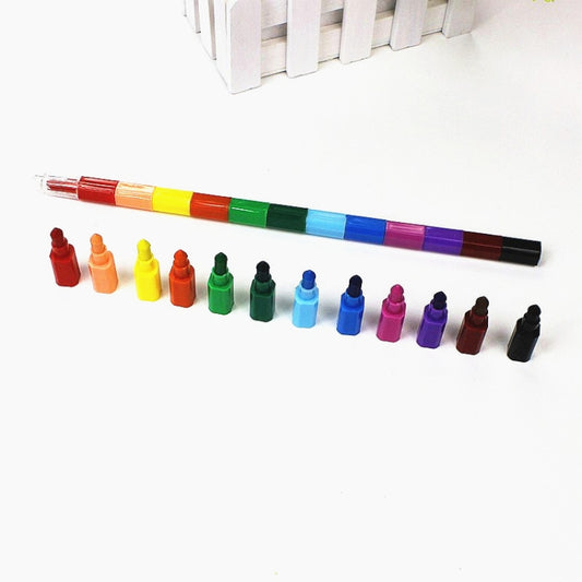 Long striped building-block crayons with caps; 12-color set shown with loose pieces