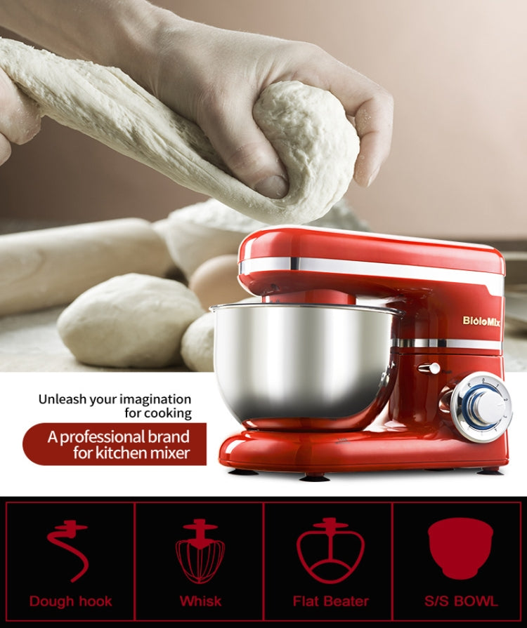 Red stand mixer with stainless bowl and splash guard beside dough pieces
