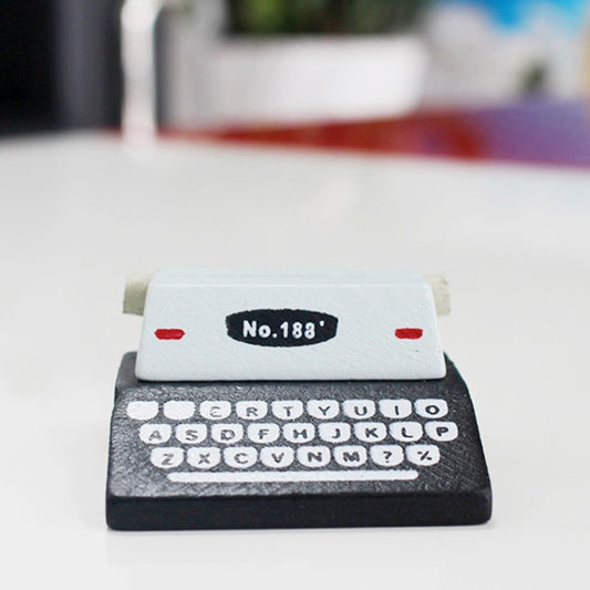 Front view of mini typewriter memo holder with No.188 label and white key letters
