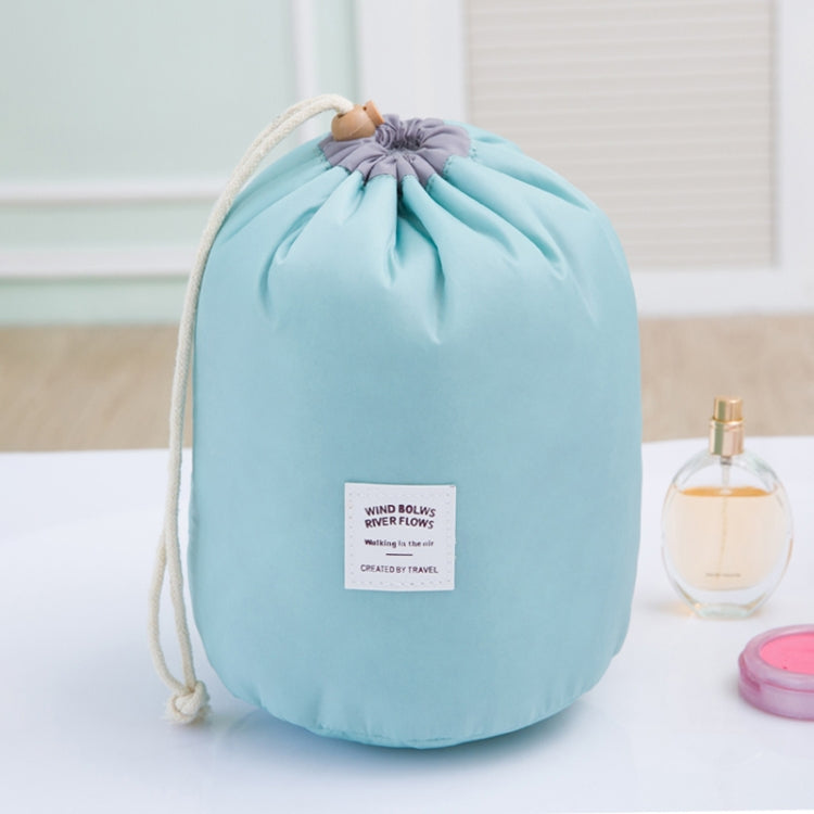 Light blue cylindrical drawstring cosmetic bag with waterproof fabric