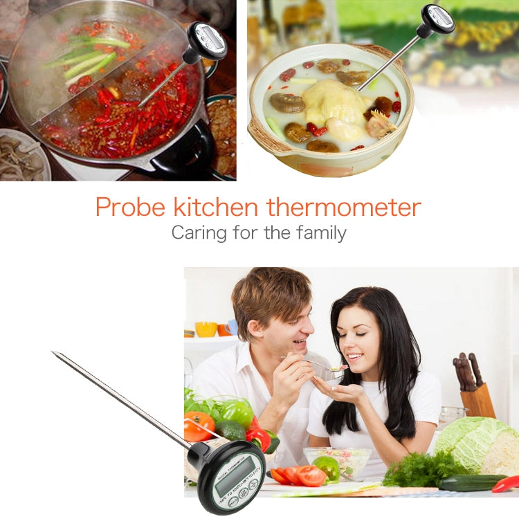 Digital probe thermometer with long probe and LCD dial shown in cooking setup