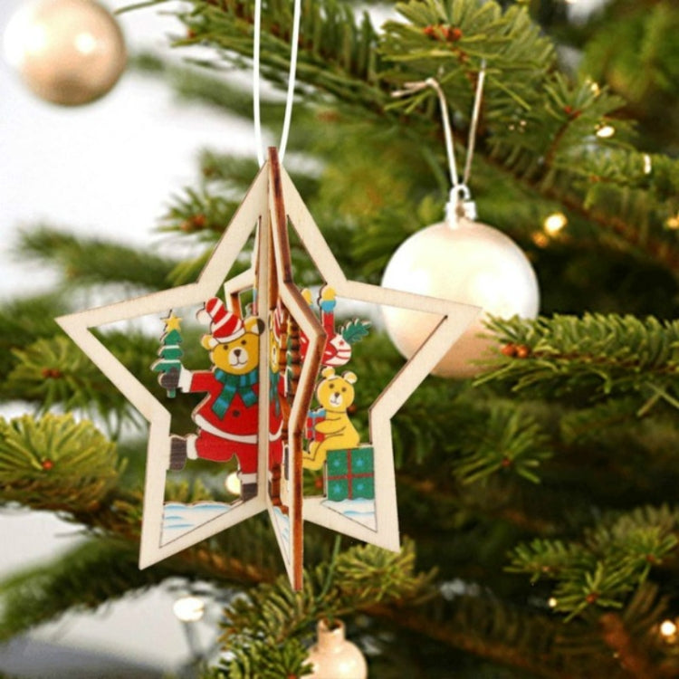 Wooden star ornament with bear and gift illustration, hanging by loop cord