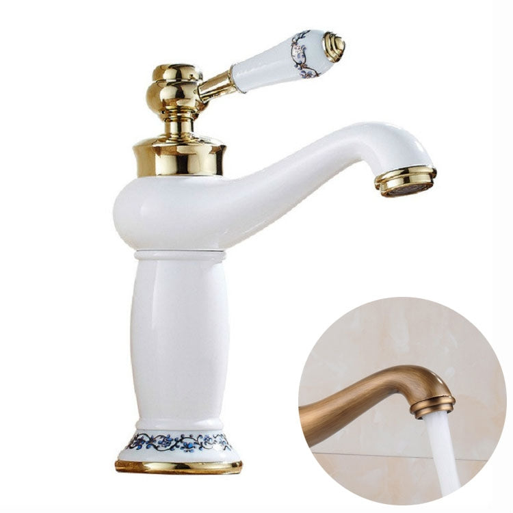 Antique-style white double-handle faucet with gold accents and blue-and-white porcelain tips