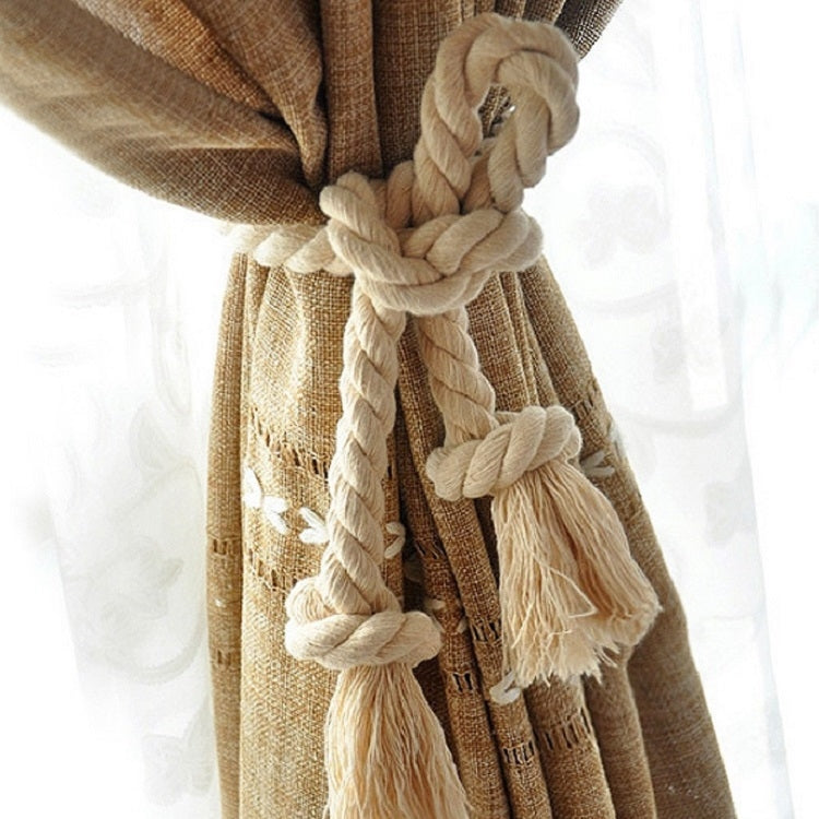 Beige cotton rope curtain tieback with braided twists and tassel fringes