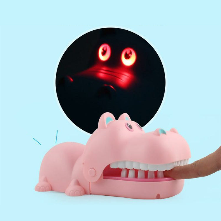 Cartoon hippo bite hand toy in pink, open mouth with glowing red light-up eyes