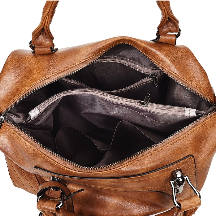 Women’s brown shoulder bag open interior with zipper closure and inner pocket