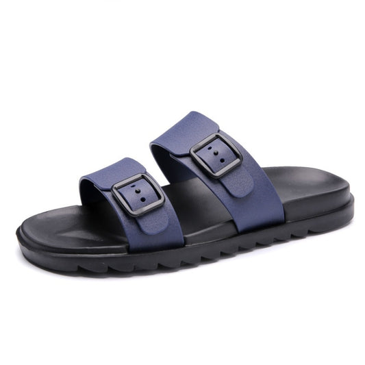 Blue adjustable slide sandals with two buckled straps and textured black sole
