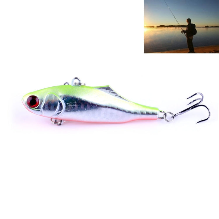 Swimbait fishing lure, silver-blue body with green highlights and twin treble hooks
