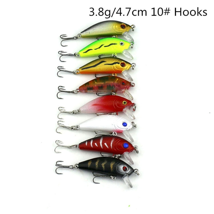 Compact assortment of colorful minnow fishing lures with treble hooks
