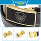 Black-plate belt buckle with gold frame on brown leather strap