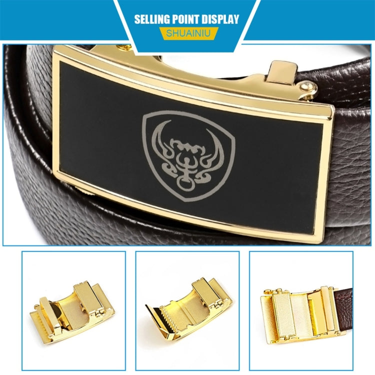 Black-plate belt buckle with gold frame on brown leather strap
