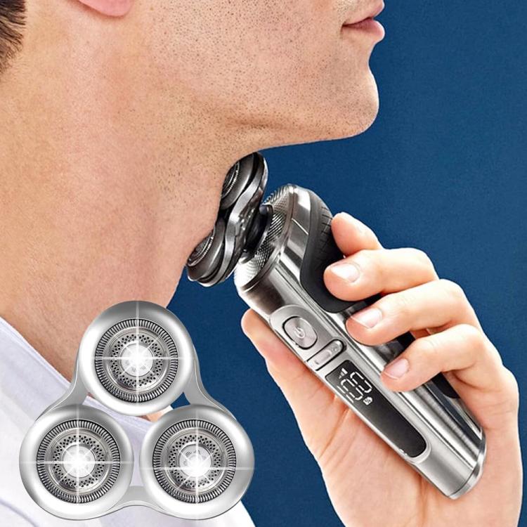 Philips electric shaver blade head held in hand, three foils on silver body