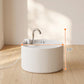 White ceramic pet water fountain with chrome faucet, compact round ribbed design