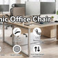 Black ergonomic office chair with headrest, flip-up armrests, and rolling base