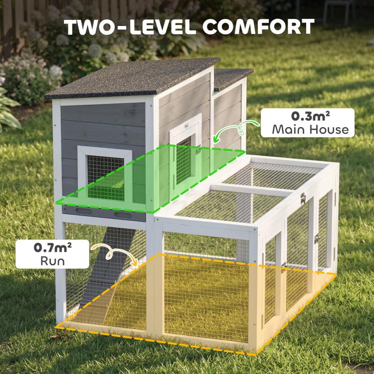 Two-level rabbit hutch with main house upper area and separate fenced run
