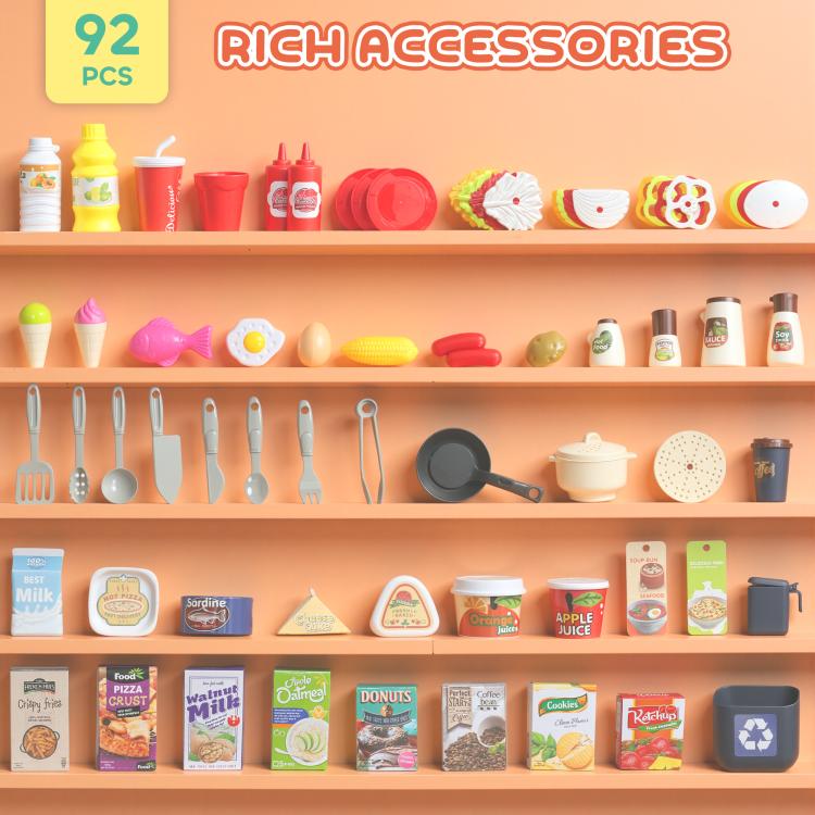 Kids play kitchen toy accessories set with 92 food and cookware pieces on shelves