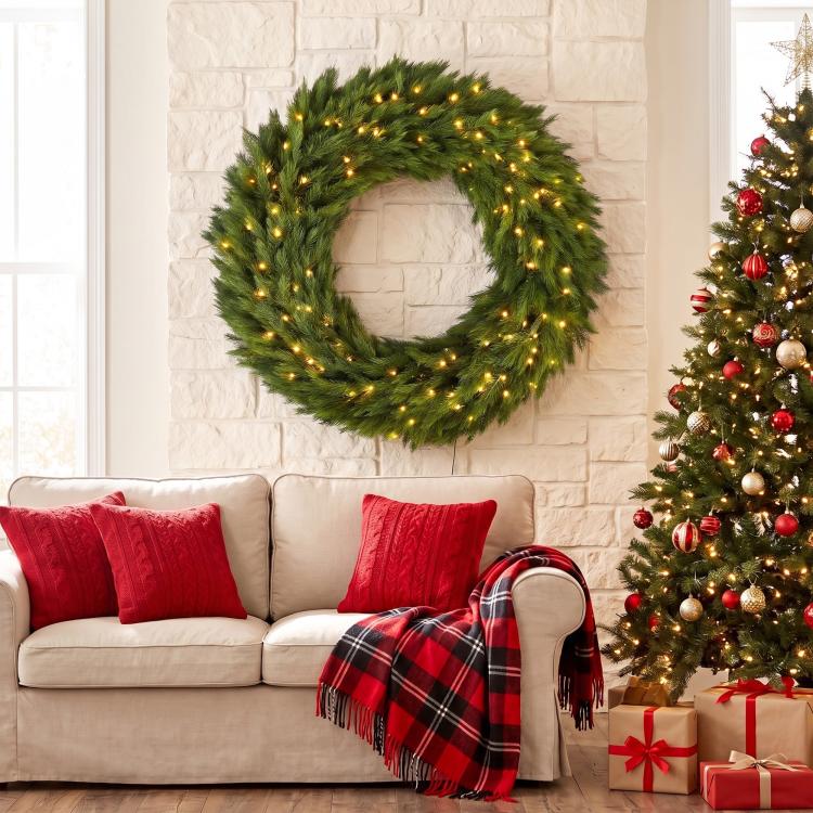 Pre-lit green Christmas wreath with warm LED lights