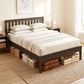 Walnut platform bed frame with slat headboard and visible under-bed storage drawers