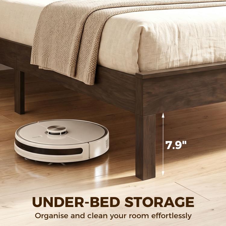 Walnut bed frame with under-bed clearance for robot vacuum on floor