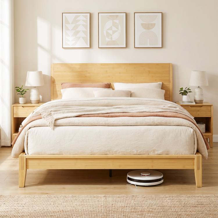 Queen bamboo platform bed with headboard and beige bedding, open slat mattress support