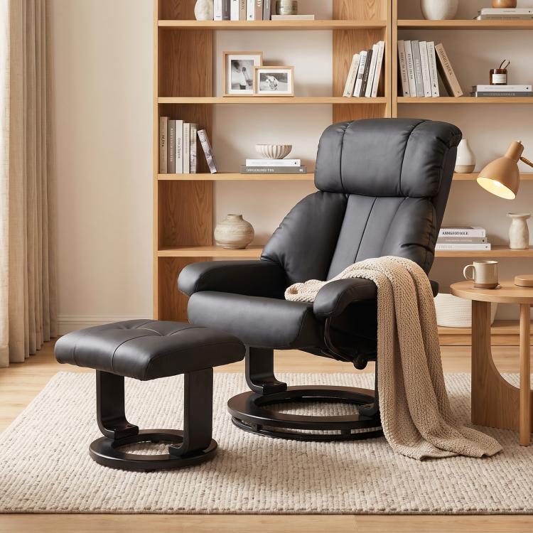 Black massage recliner chair with ottoman footstool and thick cushioned arms and back