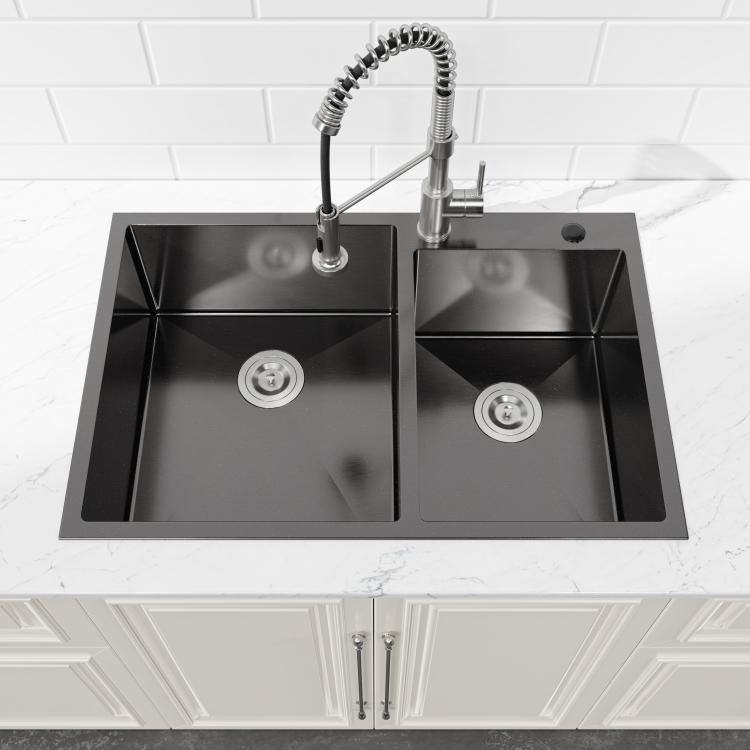 Black double-bowl kitchen sink with two compartments and two round drain openings