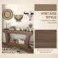 Distressed brown wood console table with open shelf and rustic textured finish