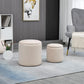 Cream white corduroy round ottoman stools with padded tops and storage lids