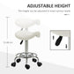White height-adjustable saddle stool with padded seat and rolling casters