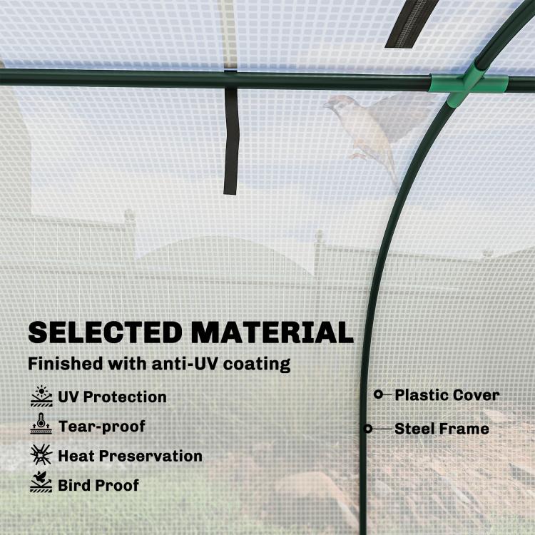 White mesh greenhouse cover attached to green metal frame bars