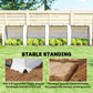 Portable tunnel greenhouse with white mesh sides and soil-buried edge flaps